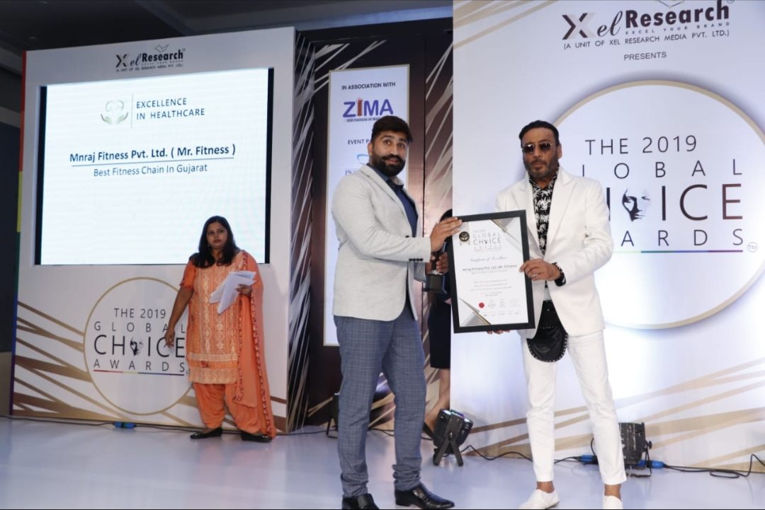 Best Fitness Chain in Gujarat — awarded to MnRaj Fitness Pvt. Ltd., presented by Jackie Shroff.